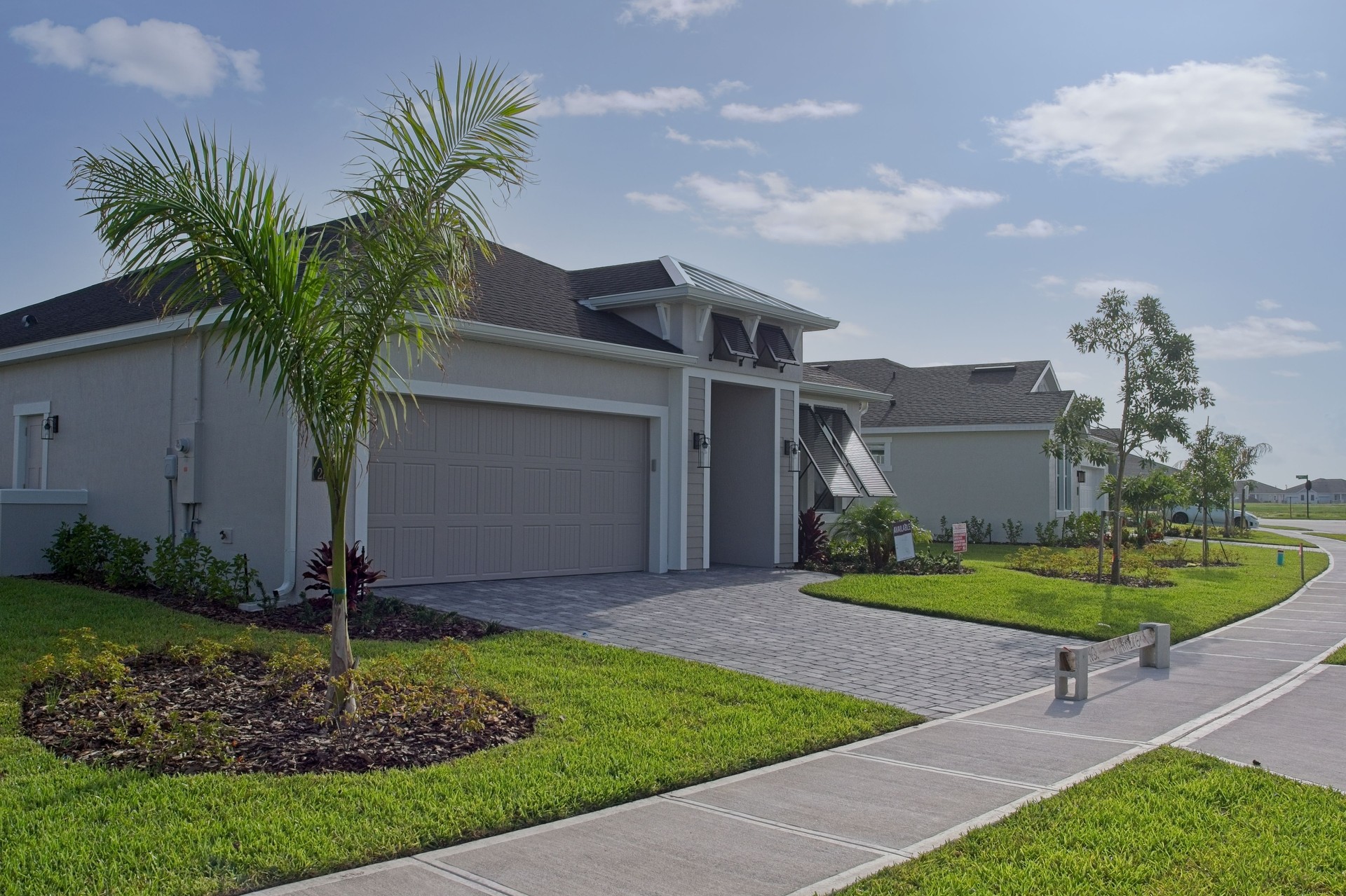 Recently completed Florida new home construction with driveway pavers